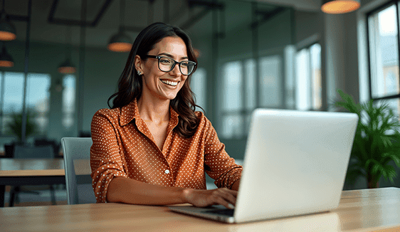Marketer reviewing streaming TV ad performance data on a laptop, representing transparent reporting and targeting precision.